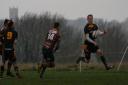 Southwold man of the match Josh Crick gets a chance to show his pace on a miserable afternoon on The Common Picture: Linda Cayley