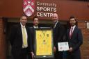 NCFC Community Sports Foundation and Ormiston Denes Academy join to become the first Suffolk based Community Hub School. Left to right, Toby Nickerson (CSF), Adam Drury (former NCFC player), Tony Bown (vice principal) and Kevin Oldman (premises manager at