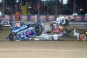 Sparks fly as the Superstox get stuck in . Photo: CHRIS BERRY