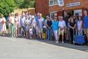 Villagers waved goodbye to their postman Steve Brown Picture: ARTHUR GROSSET