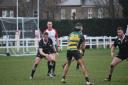 Colchester's Danny Whiteman and Harrison Pickett brace for the oncoming contact on Saturday. Photo: Maggie Whiteman