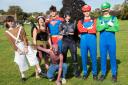 Pupils and staff at Farlingaye High School dressed up in fancy dress for the walk around Woodbridge