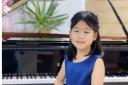 A Suffolk eight-year-old has made an astonishing feat and passed her Grade 8 piano exam.
