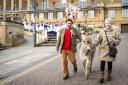 A donkey leads a Palm Sunday procession through Norwich