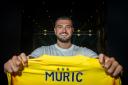 Arijanet Muric joins Ipswich Town from Burnley, signing a four-year contract