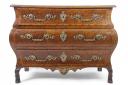 A French Louis XVI walnut veneered Bombe commode chest with an estimate of £1,500-£2,500