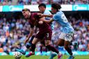 Ipswich Town defender Leif Davis goes down in the Manchester City box when sandwiched by Rico Lewis and Savinho - but no penalty was given and no VAR used.