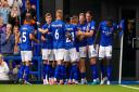 Ipswich Town's Liam Delap is congratulated by team-mates after scoring. on Saturday