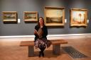 Dr Francesca Vanke, senior curator and keeper of art at Norwich Castle Museum, with the four Turner landscape paintings of Walton Bridges, at the new exhibition.