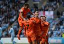 Ipswich Town players celebrate after Kieffer Moore opened the scoring at Coventry City.