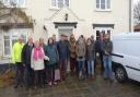 Thelnetham locals outside The White Horse, which is now operating as a community pub