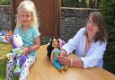 Jasmine with teddy 'Buzzy' and teddy doctor Vanessa Crawford at the annual flower festival and teddy bear parachuting bonanza in Blundeston.