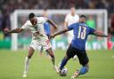 England's Raheem Sterling (left) and Italy's Emerson battle for the ball during the UEFA Euro 2020 Final at Wembley Stadium, London. Picture date: Sunday July 11, 2021.