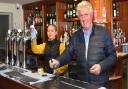 Staff and management at Moss and Co working hard behind the scenes ahead of re-opening. Managing director David Moss paints the menu boards at The Jolly Sailors in Pakefield. Picture: Mick Howes