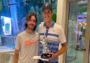 English professional golfer Tommy Fleetwood and Monty Scowsill