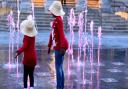 Hinna and Nadia are thrilled with the new fountain on the cornhill     Picture: SARAH LUCY BROWN