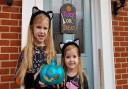 Ruby and Holly with their teal coloured pumpkin Picture: RACHEL EDGE