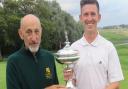 David Southgate receives the Coronation Cup from Felixstowe Ferry captain Graham Popple. Picture: TONY GARNETT