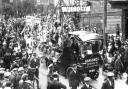 A parade passing from Norwich Road into St Matthews Street, at Barrack Corner, Ipswich, to mark victory in the First World War. It was held in the summer of 1919, judging by the date on the photograph. Picture: DAVID KINDRED COLLECTION