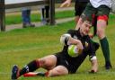 Colchester's Ben Murphy scores one of his six tries in their 112-0 win over Luton. Picture: RICHARD PARKER