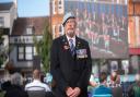 The streets of Ipswich were silent on Monday morning as over one hundred people gathered at the Cornhill to watch the funeral procession of Her Majesty The Queen.