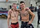 Suffolk's Arnold Allen, left, and Max Holloway after their fight in Kansas City last night