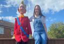 A bigger than life King Charles III has appeared on a Stowmarket fence ahead of the Coronation