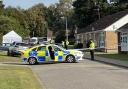 Police at the scene in Sutton Heath