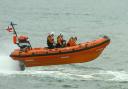 Two dogs and their owner were rescued from the sea off Walberswick Beach last week