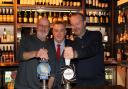 The chairman of Barton Mills Council poured a ceremonial pint