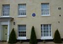 The blue plaque on Wilford Lodge, former home of Sir Archibald Garrod