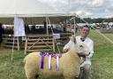 Benn Lugsden with his interbreed champion sheep Idunno