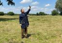 Debenham farmer Tom McVeigh searches for a mobile phone signal