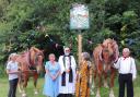 Ms Kenningale is pictured in the blue dress alongside Rev Eric Fall with Marcia Blakenham and the owners of the horses, Hazel Chapman and John Latham