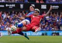 Ipswich Town's Jacob Greaves battles for the ball with Liverpool's Luis Diaz.