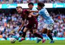 Ipswich Town defender Leif Davis goes down in the Manchester City box when sandwiched by Rico Lewis and Savinho - but no penalty was given and no VAR used.