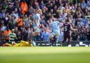 Manchester City's Kevin De Bruyne puts his side 2-1 up after an error from Ipswich Town debutant keeper Aro Muric, far left