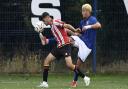 Rio Morgan battles for the ball against Sheffield United.