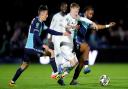 Cameron Humphreys battles against Aston Villa in the Carabao Cup.