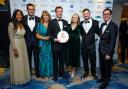 The team at the pub collecting their award in London