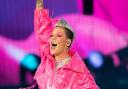 P!nk, pictured, is rescheduling four shows in the US (James Manning/PA)