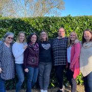 New recruits Pauline Lifton (centre) and Victoria Smith (second right) with managing director Carole Burman (left) and the rest of the MAD-HR team