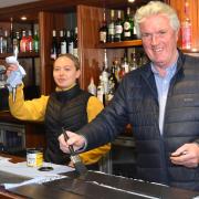 Staff and management at Moss and Co working hard behind the scenes ahead of re-opening. Managing director David Moss paints the menu boards at The Jolly Sailors in Pakefield. Picture: Mick Howes