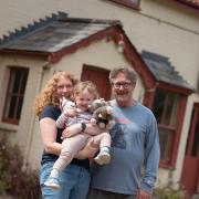 Lex Rudd and Roy Elder with their daughter Eleanore outside their new pub in Stansfield.  Picture: Sarah Lucy Brown