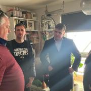 Lord Greenhalgh and MP for Ipswich Tom Hunt with residents of St Francis Tower and cladding campaigners