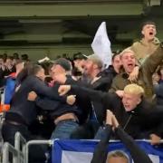 Ipswich Town fans celebrate during their 6-0 win over Doncaster Rovers last night