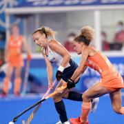 Great Britain's Hannah Martin (left) and Netherland's Maria Verschoor battle for the ball