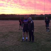 The sun came up over the club as the relay ended. Pictured in the middle is First team captain Ed Ballam with his mum, an NHS worker Picture: THURSTON RUGBY CLUB