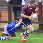 Sudbury's Austin Beckett on the run against Diss