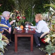 Two ladies enjoy a hot drink at Urban Jungle in Beccles